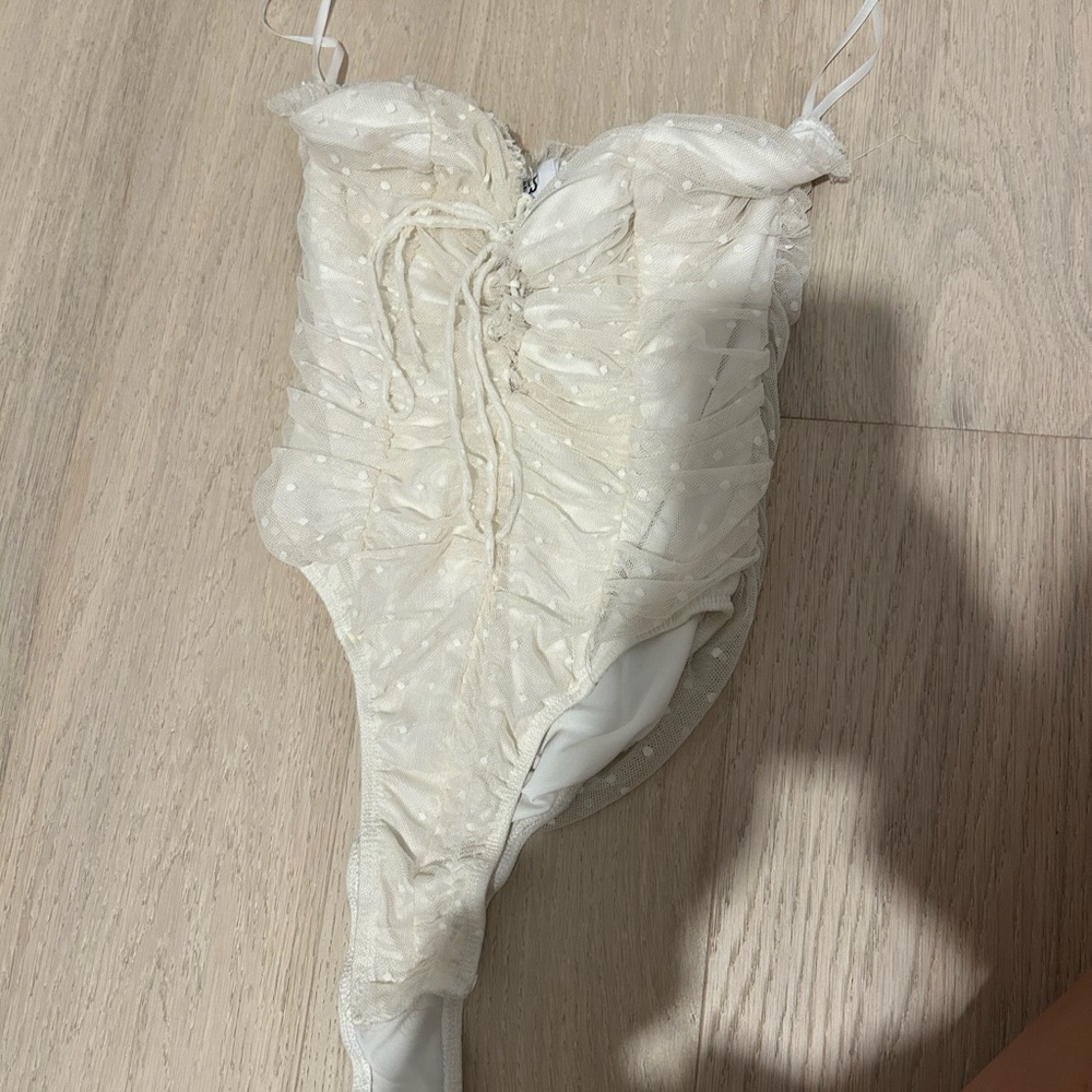 Elegant White Ruched Bodysuit